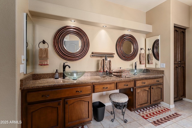 3797 N 156th Dr N, Goodyear, AZ 85395 - full bathroom with a sink, tile patterned floors, and double vanity