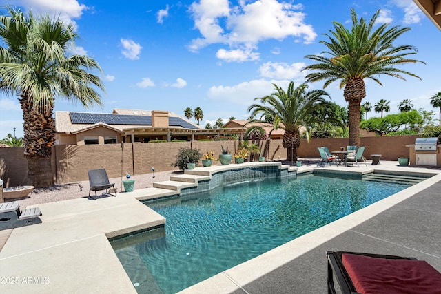 3797 N 156th Dr N, Goodyear, AZ 85395 - view of pool with a fenced backyard, a fenced in pool, a patio, and area for grilling