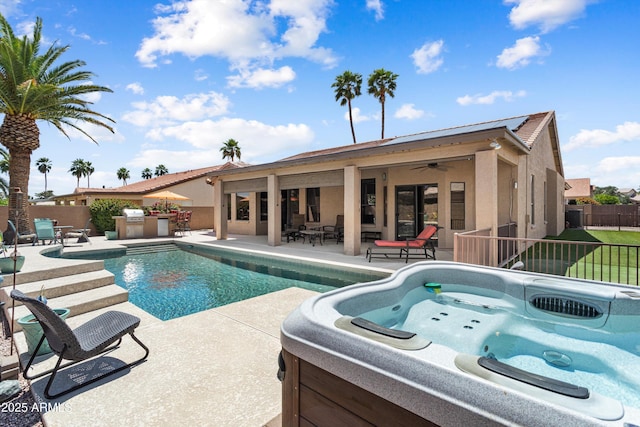 3797 N 156th Dr N, Goodyear, AZ 85395 - view of pool featuring fence, a hot tub, ceiling fan, area for grilling, and a patio area