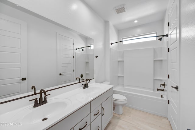5875 N 193rd Dr, Litchfield Park, AZ 85340 - full bathroom featuring a sink, visible vents, toilet, and bathtub / shower combination