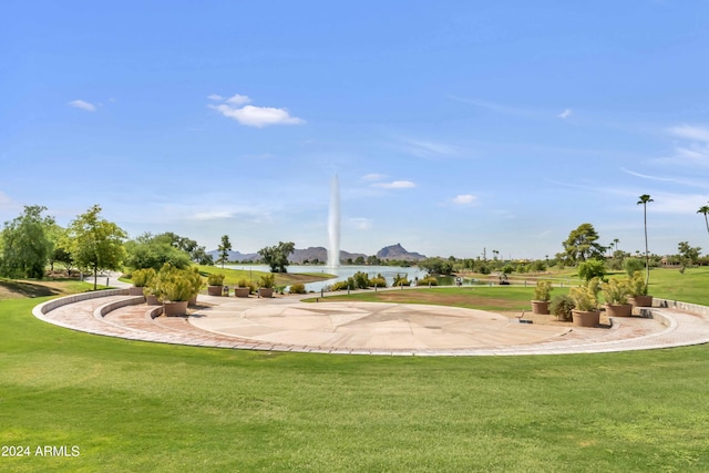 14910 N Kings Way Unit 206, Fountain Hills, AZ 85268 - surrounding community with a lawn and a water and mountain view