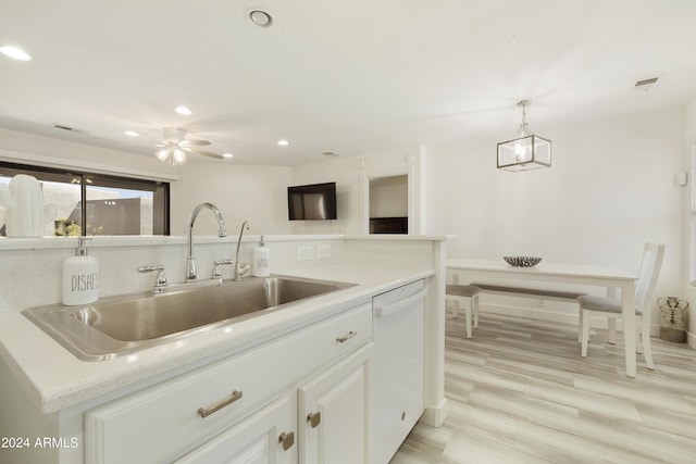 14910 N Kings Way Unit 206, Fountain Hills, AZ 85268 - kitchen featuring a sink, white dishwasher, recessed lighting, light countertops, and white cabinetry