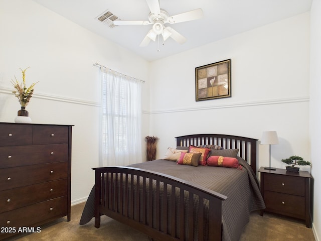 carpeted bedroom featuring a ceiling fan