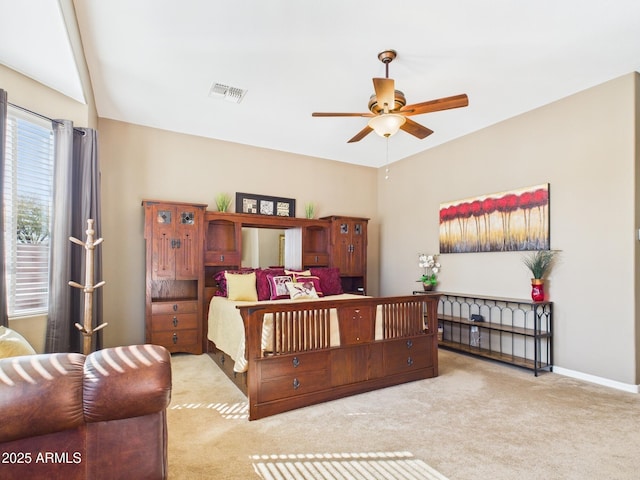 bedroom featuring carpet, visible vents, and baseboards