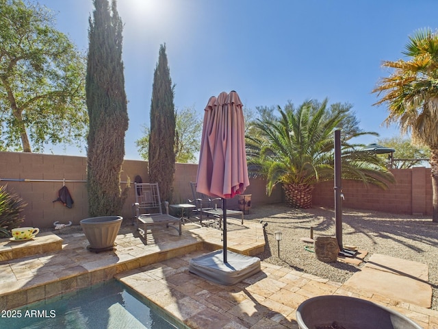 view of patio with a fenced backyard