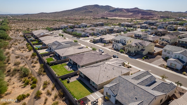 birds eye view of property featuring a mountain view