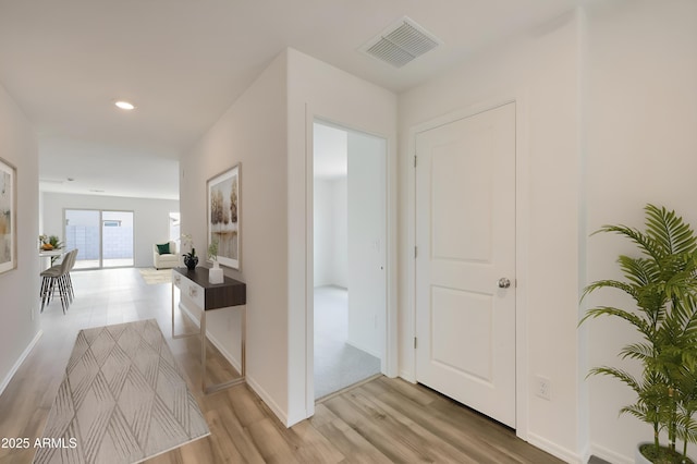 hall featuring light wood-type flooring