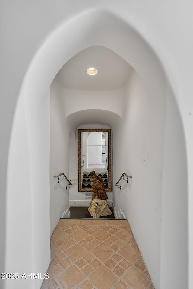2671 Hwy 82, Patagonia, AZ 85624 - stairway featuring arched walkways, stone finish floors, and recessed lighting