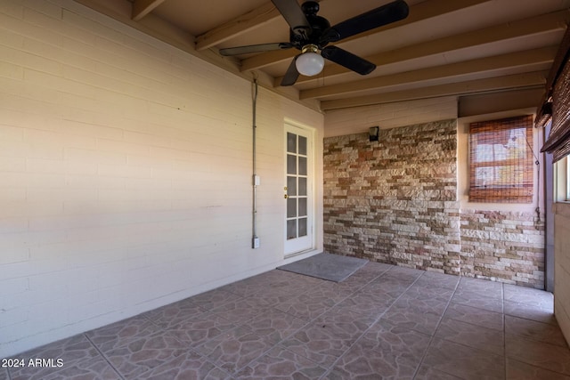 view of patio featuring ceiling fan