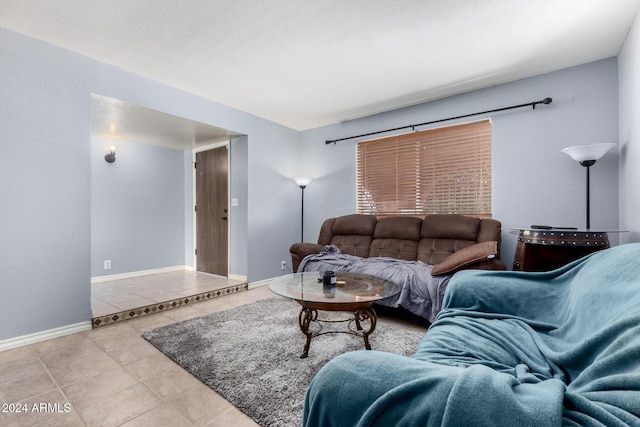 living room featuring light tile patterned flooring