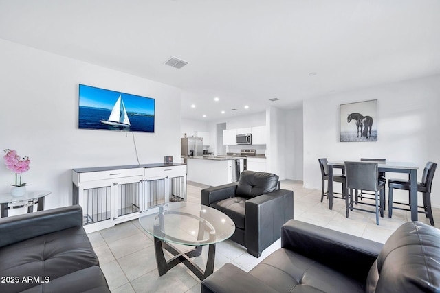 living room featuring light tile patterned floors