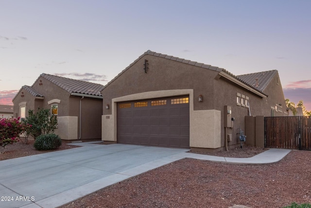 view of front of property featuring a garage