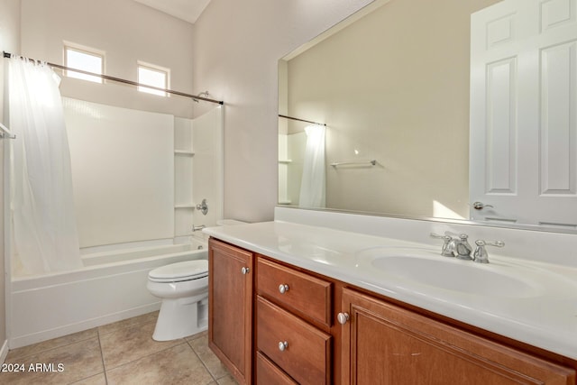 full bathroom featuring toilet, tile patterned floors, vanity, and shower / tub combo with curtain