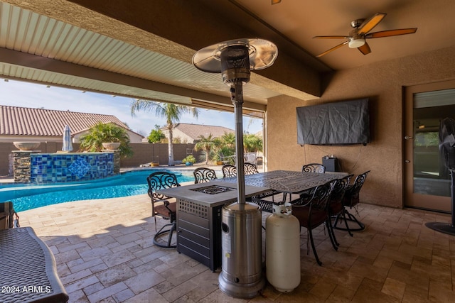 view of patio / terrace with a fenced in pool