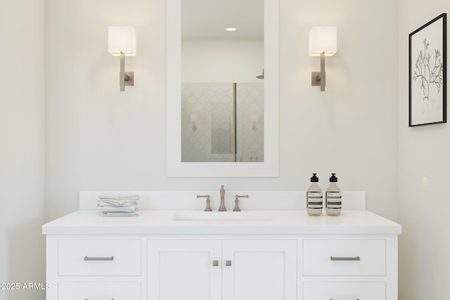 bathroom with walk in shower and vanity