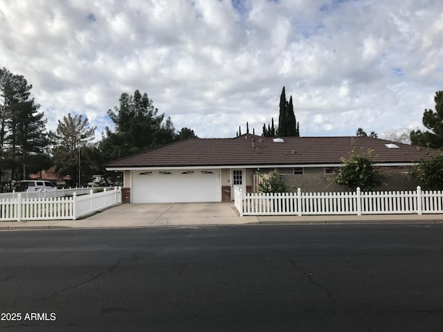 ranch-style home with a garage