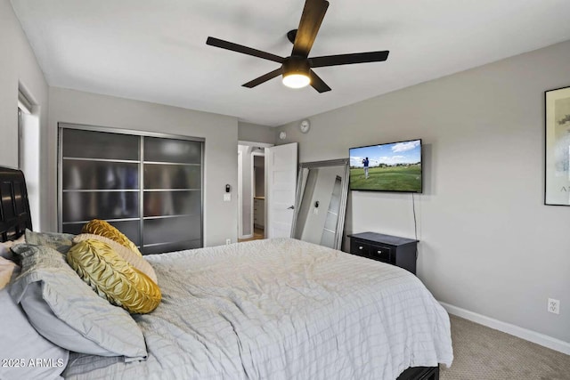 carpeted bedroom featuring ceiling fan