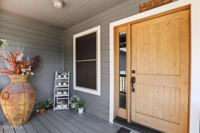 entrance to property with a porch