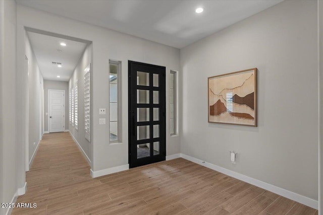 5860 E Sanford St, Mesa, AZ 85215 - entrance foyer with light wood-style flooring, baseboards, and recessed lighting