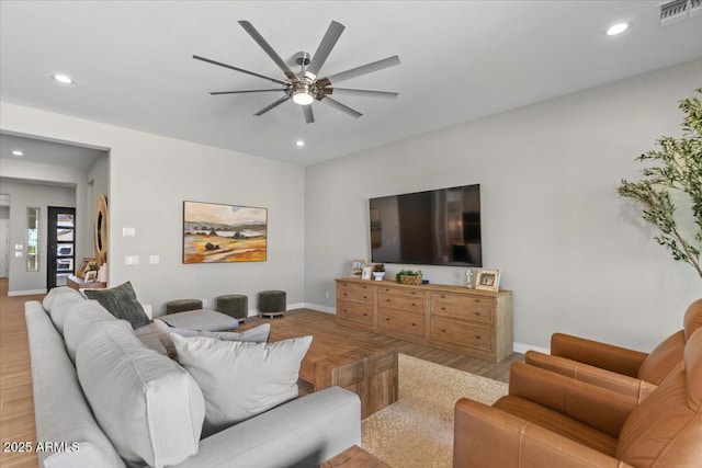 5860 E Sanford St, Mesa, AZ 85215 - living room with baseboards, recessed lighting, a ceiling fan, visible vents, and wood finished floors
