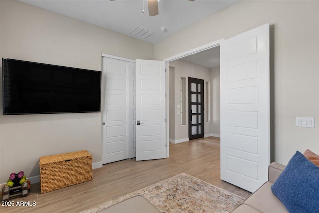 5860 E Sanford St, Mesa, AZ 85215 - bedroom featuring visible vents, baseboards, a ceiling fan, and wood finished floors