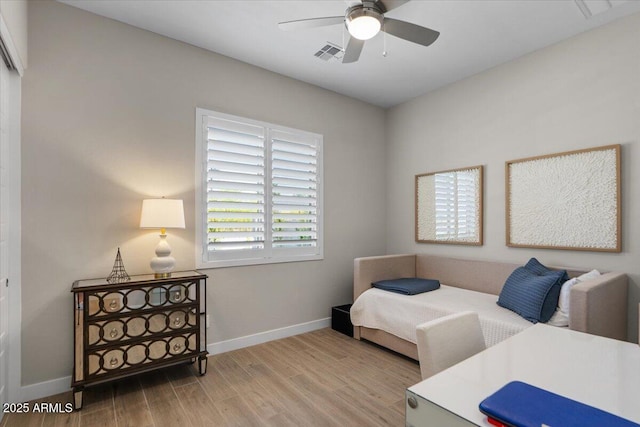 5860 E Sanford St, Mesa, AZ 85215 - bedroom with ceiling fan, visible vents, baseboards, and wood finished floors