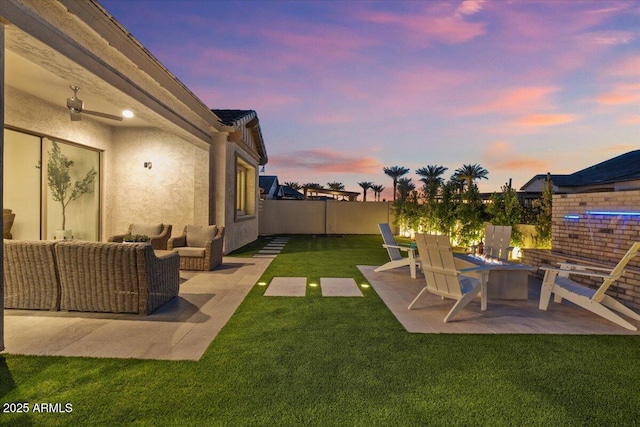 5860 E Sanford St, Mesa, AZ 85215 - yard at dusk featuring a patio and a fenced backyard