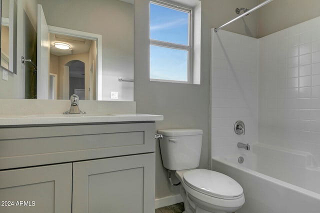 full bathroom featuring vanity, toilet, and shower / tub combination