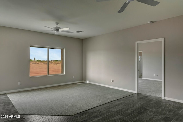 carpeted empty room with ceiling fan