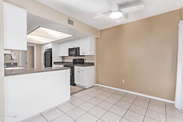 kitchen with kitchen peninsula, white cabinetry, sink, and black appliances