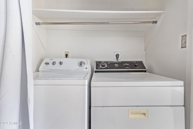 laundry area featuring independent washer and dryer