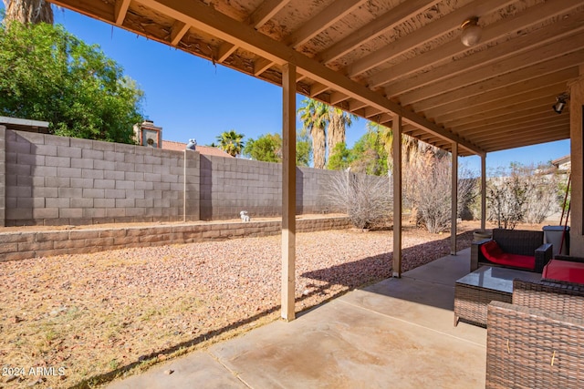 10096 N 63rd Ave, Glendale, AZ 85302 - fenced backyard with a patio area and outdoor lounge area