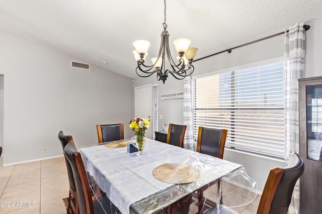 10096 N 63rd Ave, Glendale, AZ 85302 - dining space with a chandelier, light tile patterned floors, and a textured ceiling