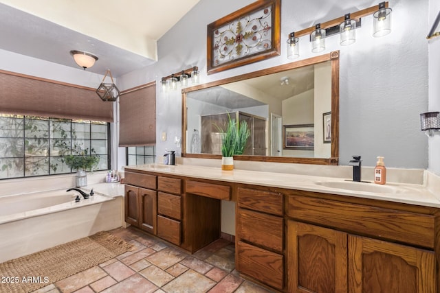 bathroom featuring vanity and a bathing tub