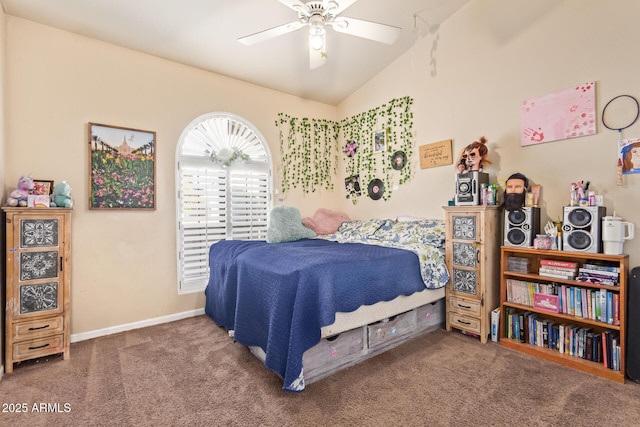 carpeted bedroom with ceiling fan and vaulted ceiling