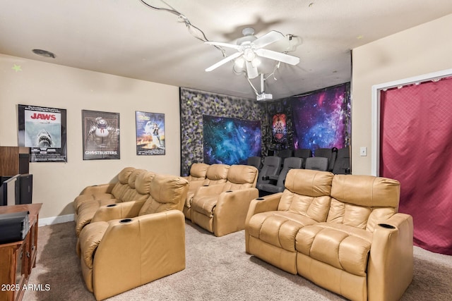 carpeted cinema featuring ceiling fan