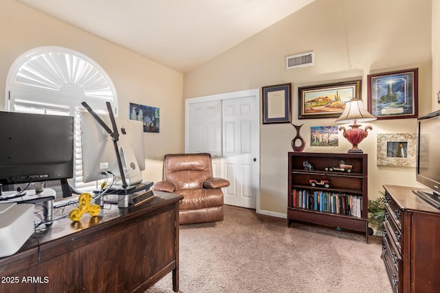 office area featuring vaulted ceiling