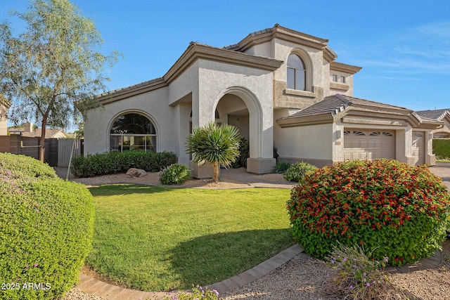 6435 E Monte Cristo Ave, Scottsdale, AZ 85254 - mediterranean / spanish home with stucco siding, a garage, a tiled roof, and driveway