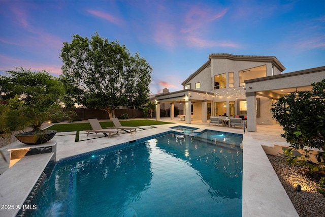 6435 E Monte Cristo Ave, Scottsdale, AZ 85254 - view of swimming pool featuring outdoor lounge area, a patio area, and a pool with connected hot tub