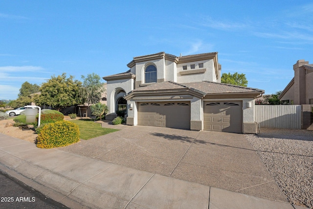 6435 E Monte Cristo Ave, Scottsdale, AZ 85254 - view of front of property featuring stucco siding, driveway, a tiled roof, an attached garage, and a garage