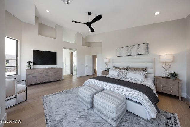 6435 E Monte Cristo Ave, Scottsdale, AZ 85254 - bedroom with light wood-style floors, recessed lighting, high vaulted ceiling, and a ceiling fan