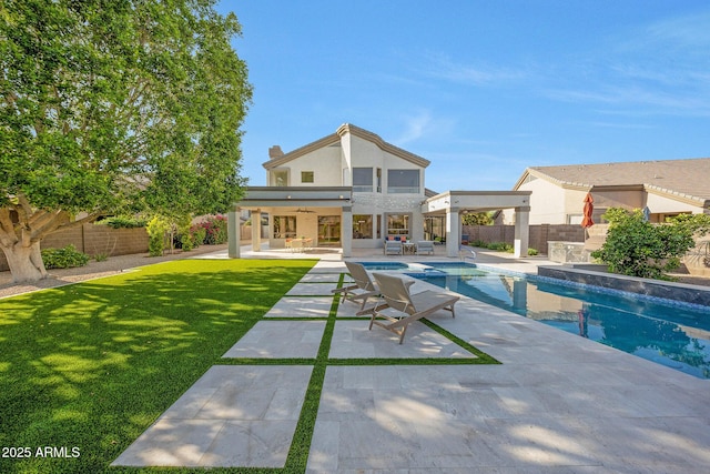 6435 E Monte Cristo Ave, Scottsdale, AZ 85254 - view of pool with ceiling fan, a fenced backyard, a patio area, and outdoor lounge area