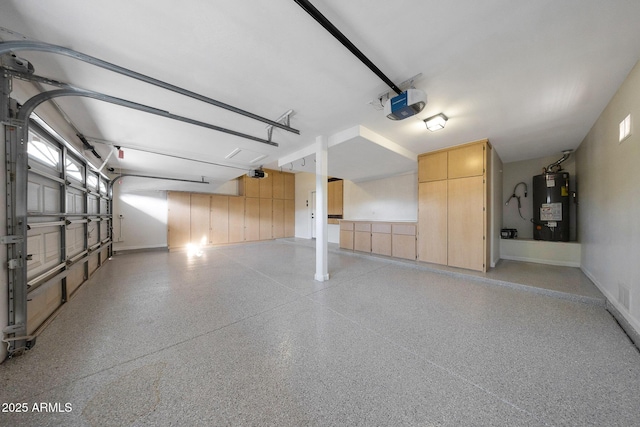 6435 E Monte Cristo Ave, Scottsdale, AZ 85254 - garage with water heater and a garage door opener
