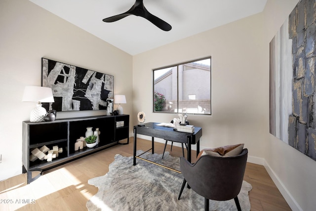 6435 E Monte Cristo Ave, Scottsdale, AZ 85254 - home office featuring a ceiling fan and wood finished floors