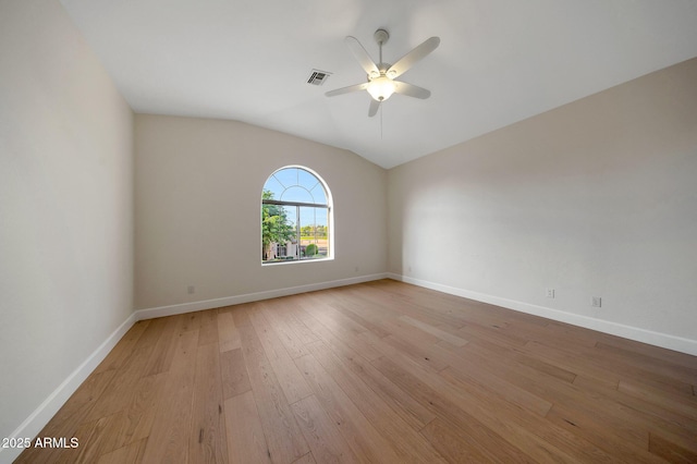 6435 E Monte Cristo Ave, Scottsdale, AZ 85254 - empty room featuring light wood-type flooring, a ceiling fan, and vaulted ceiling