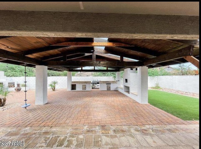 view of patio with an outdoor kitchen