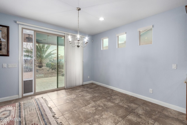 3937 N Smithsonian Dr, Florence, AZ 85132 - unfurnished dining area with baseboards and a chandelier