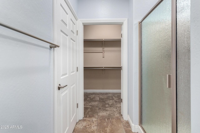 3937 N Smithsonian Dr, Florence, AZ 85132 - spacious closet with stone finish floor