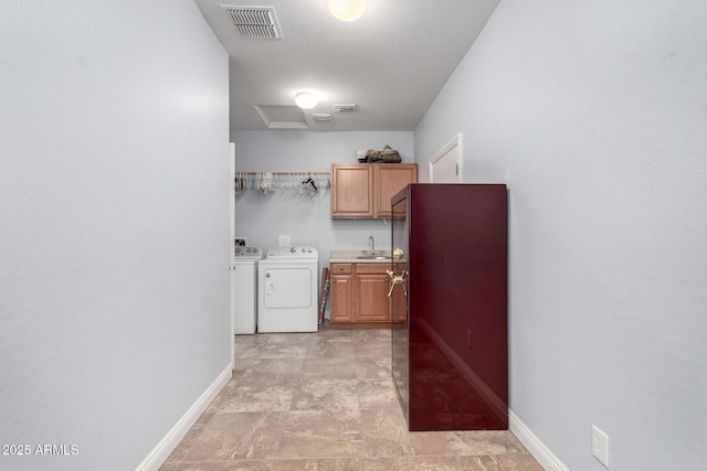 3937 N Smithsonian Dr, Florence, AZ 85132 - laundry area with cabinet space, separate washer and dryer, baseboards, and visible vents