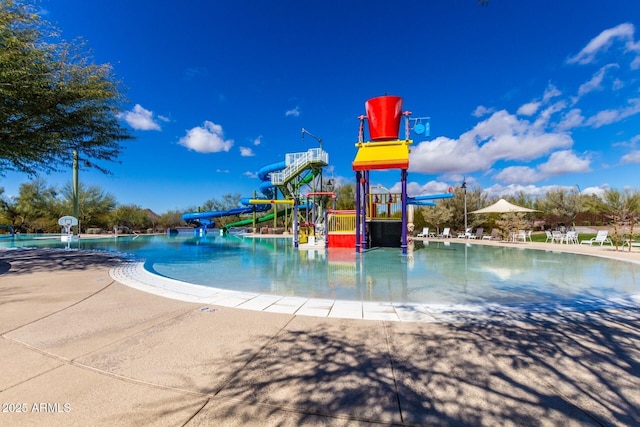 3937 N Smithsonian Dr, Florence, AZ 85132 - view of playground featuring a water play area and a community pool